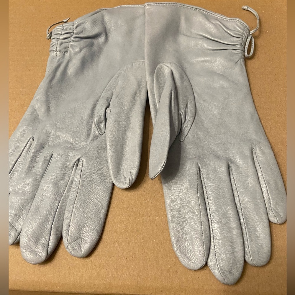 Light Grey leather glove’s medium like new